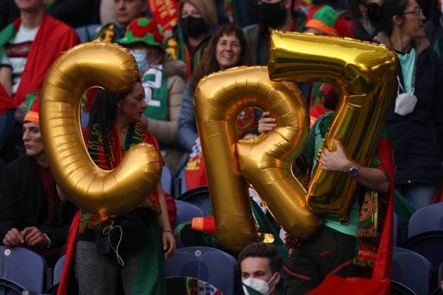 Porto, Portugal, 29th March 2022. Fans hold up inflatable letters to spell out CR7 for Cristiano Ronaldo of Portugal during the FIFA World Cup, WM, Weltmeisterschaft, Fussball 2022 - European Qualifying match at the Estadio do Dragao, Porto. Picture credit should read: Jonathan Moscrop Sportimage EDITORIAL USE ONLY. No use with unauthorised audio, video, data, fixture lists, club league logos or live services. Online in-match use limited to 120 images, no video emulation. No use in betting, games or single club league player publications. SPI-1609-0111