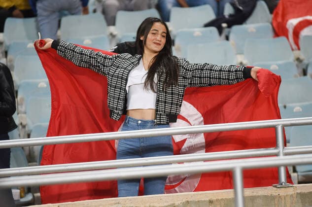 March 29, 2022, Tunis, Tunisia: Tunisian supporter holds a flag during the second leg of the 2022 Qatar World Cup African Qualifiers football match between Tunisia and Mali at the Hamadi Agrebi Olympic stadium in the city of Rades. Final score First Match; Tunisia 1:0 Mali, Second Match; Tunisia 0:0 Mali. Tunis Tunisia - ZUMAs197 0153990579st Copyright: xjdidixwassimx