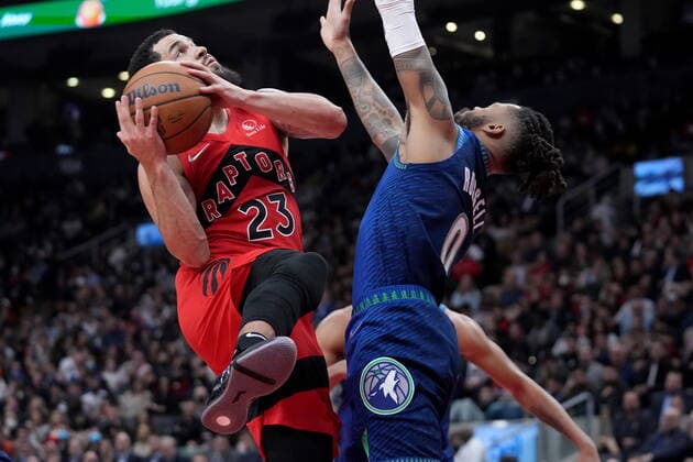 March 30, 2022, TORONTO, ON, CANADA: Toronto Raptors guard Fred VanVleet (23) gets fouled by Minnesota Timberwolves guard D Angelo Russell (0) during first half NBA, Basketball Herren, USA basketball action in Toronto, Wednesday, March 30, 2022. Canada News - March 30, 2022  - ZUMAc35_ 20220330_zaf_c35_130 Copyright: xNathanxDenettex