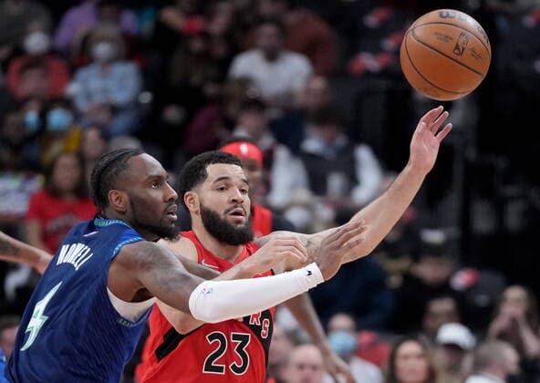 March 30, 2022, TORONTO, ON, CANADA: Toronto Raptors guard Fred VanVleet (23) and Minnesota Timberwolves guard Jaylen Nowell (4) chase a loose ball during first half NBA, Basketball Herren, USA basketball action in Toronto, Wednesday, March 30, 2022. Canada News - March 30, 2022  - ZUMAc35_ 20220330_zaf_c35_139 Copyright: xNathanxDenettex