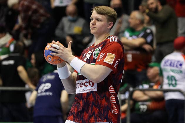Justus Fischer TSV Hannover Burgdorf,54 Handball Bundesliga season 2021 2022 SC Magdeburg vs TSV Hannover Burgdorf in the GETEC Arena in Magdeburg single image,action,man,men,handball,Germany,31 03 2022