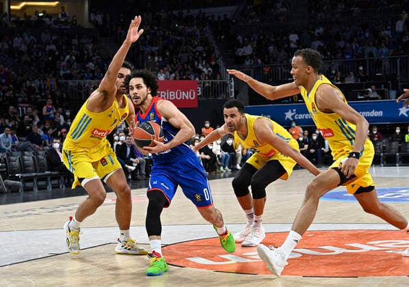 Shane Larkin (0) of Anadolu Efes Istanbul and Maodo Lo (1) , Johannes Thiemann (32) , Louis Olinde (19) of Alba Berlin during the Turkish Airlines EuroLeague Regular Season Round 33 match between Anadolu Efes Istanbul and Alba Berlin at Sinan Erdem Sports Arena in Istanbul, Turkey , on April 01, 2022 