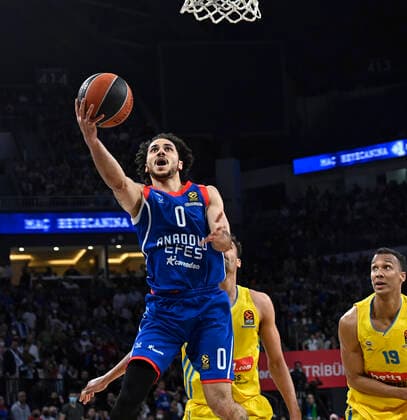 Shane Larkin (0) of Anadolu Efes Istanbul and Louis Olinde (19) of Alba Berlin during the Turkish Airlines EuroLeague Regular Season Round 33 match between Anadolu Efes Istanbul and Alba Berlin at Sinan Erdem Sports Arena in Istanbul, Turkey , on April 01, 2022 