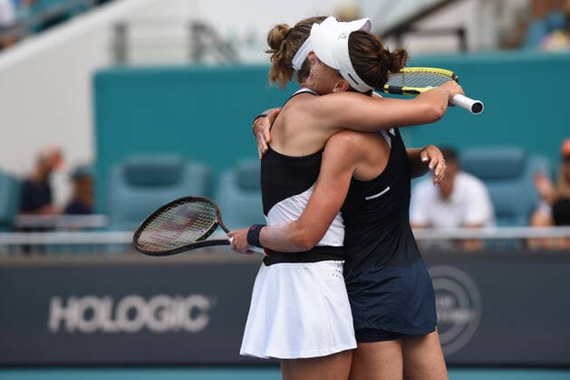 MIAMI GARDENS, FL - APRIL 1: Elise Mertens of Belgium and Veronika Kudermetova of Russia celebrate against Coco Gauff and Catherine McNally during the WomenÕs doubles semifinal for the Miami Open on April 1, 2022, at Hard Rock Stadium in Miami Gardens, Florida. (Photo by Michele Eve Sandberg Icon Sportswire) TENNIS: APR 01 Miami Open Icon220401693