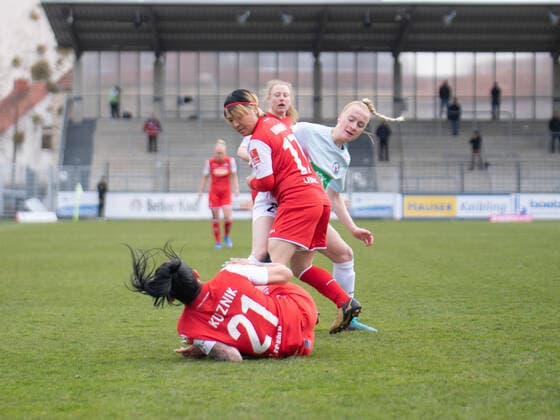 Peggy Kuznik 21 FC Cologne and Yuka Hirano 17 FC Cologne clear the ball against Anna Gerhardt 21 Potsdam during the Flyeralarm womens Bundesliga match 1 FFC Turbine Potsdam 1 FC Cologne on 02 04 2022 Potsdam Karl Liebnkecht Stadion Brandenburg Germany