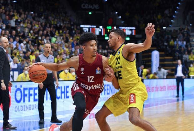 GER, Basketball,easy Credit BBL, EWE Baskets Oldenburg vs FC Bayern Munich Basketball 02 04 2022, EWE Arena, Oldenburg, GER, easy Credit BBL, EWE Baskets Oldenburg vs FC Bayern Munich Basketball , in picture Jason GEORGE FC Bayern Munich Basketball 12 TJ HOLYFIELD EWE Baskets Oldenburg 22 nordphotoxRojahn nph00310