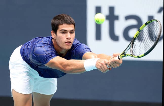 April 3, 2022, Miami Gardens, Florida, United States Of America: MIAMI GARDENS, FLORIDA - APRIL 03: Carlos Alcaraz of Spain makes history as the first spaniard and youngest player to win the Miami Open. The 18-year-old claimed his first ATP, Tennis Herren Masters 1000 title with a straight-set victory over Casper Ruud of Norway in the men s final of the Miami Open at the Hard Rock Stadium on April 03, 2022 in Miami Gardens, Florida....People: Carlos Alcaraz Garfia Miami Gardens United States Of America - ZUMAs214 20220403_zda_s214_055 Copyright: xSMGx