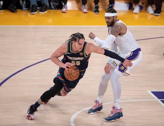 April 3, 2022, Los Angeles, California, USA: Camelo Anthony 7 of the Los Angeles Lakers defends against Aaron Gordon 50 of the Denver Nuggets during their NBA, Basketball Herren, USA game on Sunday April 3, 2022 at Crypto.com Arena in Los Angeles, California. Lakers lose to Nuggets, 118-129. PI Los Angeles USA - ZUMAp124 20220403_zaa_p124_020 Copyright: xJAVIERxROJASx