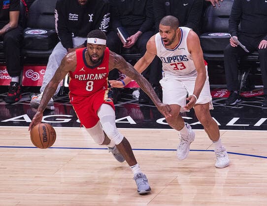 April 3, 2022, Los Angeles, California, USA: Naji Marshall 8 of the New Orleans Pelicans takes possession of the ball as Nicolas Batum 33 of the Los Angeles Clippers plays defense during their NBA, Basketball Herren, USA game on Sunday April 3, 2022 at Crypto.com Arena in Los Angeles, California. Clippers defeat Pelicans, 119-100. ARIANA RUIZ PI Los Angeles USA - ZUMAp124 20220403_zaa_p124_079 Copyright: xArianaxRuizx