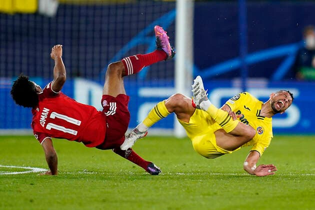 Bilder des Jahres 2022, Sport 04 April Sport Themen der Woche KW14 Sport Bilder des Tages ESP: Villarreal CF - Bayern Munich. UEFA Champions League Francis Coquelin of Villarreal CF and Kingsley Coman of Bayern Munich during the UEFA Champions League match between Villarreal CF and Bayern Munich played at La Ceramica Stadium on April 6, 2022 in Villarreal, Spain. kpng Copyright: xSergioxRuizx xPRESSINPHOTOx PS_220406_027