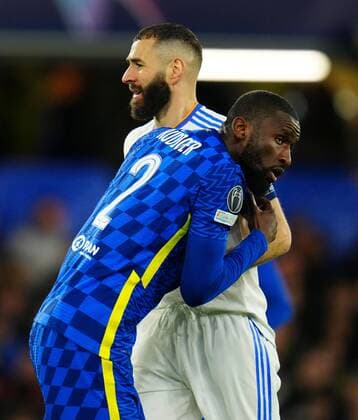 Mandatory Credit: Photo by Javier Garcia Shutterstock (12883334ap) Antonio Rudiger of Chelsea grapples with Karim Benzema of Real Madrid Chelsea v Real Madrid, UEFA Champions League, Quarter Final, First Leg, Football, Stamford Bridge, London, UK - 06 Apr 2022 EDITORIAL USE ONLY No use with unauthorised audio, video, data, fixture lists, club league logos or live services. Online in-match use limited to 120 images, no video emulation. No use in betting, games or single club league player publications. Chelsea v Real Madrid, UEFA Champions League, Quarter Final, First Leg, Football, Stamford Bridge, London, UK - 06 Apr 2022 EDITORIAL USE ONLY No use with unauthorised audio, video, data, fixture lists, club league logos or live services. Online in-match use limited to 120 images, no video emulation. No use in betting, games or single club league player publications. Copyright: xJavierxGarcia Shutterstockx 12883334ap