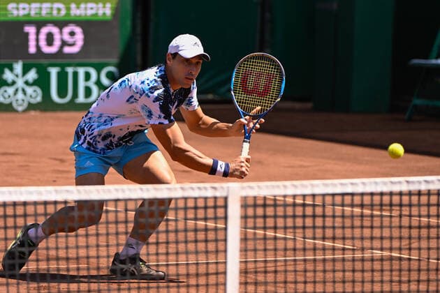 HOUSTON, TX - APRIL 07: Fernando Romboli (BRA) hits a return during the US Clay Court Championships quarterfinal doubles match at River Oaks Country Club on April 7, 2022 in Houston, TX. (Photo by Ken Murray Icon Sportswire) TENNIS: APR 07 U.S. Men™s Clay Court Championship Icon220407004
