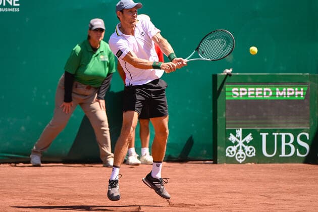 HOUSTON, TX - APRIL 07: Matthew Ebden (AUS) hits a return during the US Clay Court Championships quarterfinal doubles match at River Oaks Country Club on April 7, 2022 in Houston, TX. (Photo by Ken Murray Icon Sportswire) TENNIS: APR 07 U.S. Men™s Clay Court Championship Icon220407010