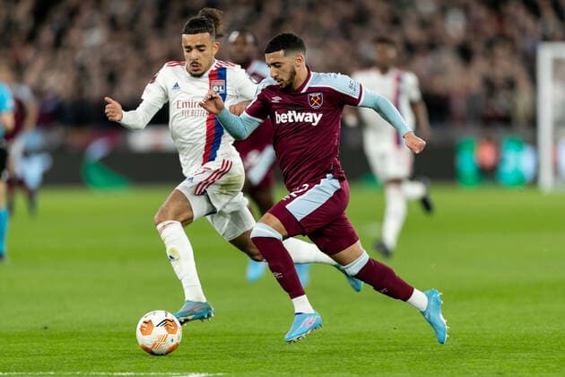 Mandatory Credit: Photo by Juan Gasparini JMP Shutterstock (12885956i) Said Benrahma of West Ham United and Malo Gusto of Lyon compete for the ball West Ham United v Lyon, UK - 07 Apr 2022 Editorial use only West Ham United v Lyon, UK - 07 Apr 2022 Editorial use only  Copyright: xJuanxGasparini JMP Shutterstockx 12885956i