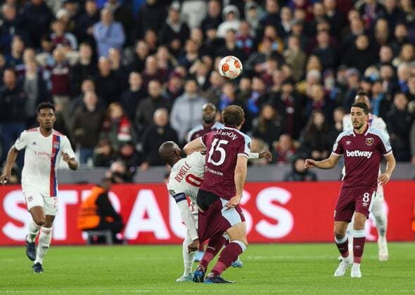 Mandatory Credit: Photo by Andrew Fosker Shutterstock (12885085bd) Moussa Dembele of Lyon appears to hold the shorts of Craig Dawson of West Ham United West Ham United v Olympique Lyonnais, UEFA Europa League, Quarter Final, First Leg, Football, The London Stadium, London, UK - 07 Apr 2022 EDITORIAL USE ONLY No use with unauthorised audio, video, data, fixture lists, club league logos or live services. Online in-match use limited to 120 images, no video emulation. No use in betting, games or single club league player publications. West Ham United v Olympique Lyonnais, UEFA Europa League, Quarter Final, First Leg, Football, The London Stadium, London, UK - 07 Apr 2022 EDITORIAL USE ONLY No use with unauthorised audio, video, data, fixture lists, club league logos or live services. Online in-match use limited to 120 images, no video emulation. No use in betting, games or single club league player publications. Copyright: xAndrewxFosker Shutterstockx 12885085bd