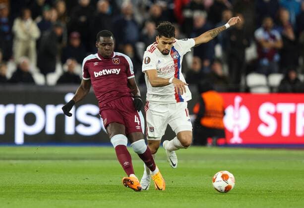 Mandatory Credit: Photo by Andrew Fosker Shutterstock (12885085be) Kurt Zouma of West Ham United and Lucas Paqueta of Lyon West Ham United v Olympique Lyonnais, UEFA Europa League, Quarter Final, First Leg, Football, The London Stadium, London, UK - 07 Apr 2022 EDITORIAL USE ONLY No use with unauthorised audio, video, data, fixture lists, club league logos or live services. Online in-match use limited to 120 images, no video emulation. No use in betting, games or single club league player publications. West Ham United v Olympique Lyonnais, UEFA Europa League, Quarter Final, First Leg, Football, The London Stadium, London, UK - 07 Apr 2022 EDITORIAL USE ONLY No use with unauthorised audio, video, data, fixture lists, club league logos or live services. Online in-match use limited to 120 images, no video emulation. No use in betting, games or single club league player publications. Copyright: xAndrewxFosker Shutterstockx 12885085be