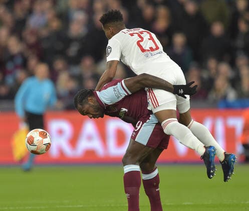 Mandatory Credit: Photo by Arfa Griffiths West Ham United Shutterstock (12885365ab) Michail Antonio of West Ham United in action with Thiago Mendes of Olympique Lyonnaise West Ham United v Olympique Lyonnais, UEFA Europa League, Quarter Final, First Leg, Football, The London Stadium, London, UK - 07 Apr 2022 EDITORIAL USE ONLY No use with unauthorised audio, video, data, fixture lists, club league logos or live services. Online in-match use limited to 120 images, no video emulation. No use in betting, games or single club league player publications. West Ham United v Olympique Lyonnais, UEFA Europa League, Quarter Final, First Leg, Football, The London Stadium, London, UK - 07 Apr 2022 EDITORIAL USE ONLY No use with unauthorised audio, video, data, fixture lists, club league logos or live services. Online in-match use limited to 120 images, no video emulation. No use in betting, games or single club league player publications. Copyright: xArfaxGriffiths WestxHamxUnited Shutterstockx 12885365ab