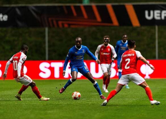 Mandatory Credit: Photo by Luke Nickerson Rangers FC Shutterstock (12885361x) Glen Kamara of Rangers on the ball during the Europa League quarter final match at the Municipal Stadium, Braga. Braga v Rangers, UEFA Europa League, Quarter Final, First Leg, Football, Estadio Municipal de Braga, Braga, Portugal - 07 Apr 2022 EDITORIAL USE ONLY No use with unauthorised audio, video, data, fixture lists, club league logos or live services. Online in-match use limited to 120 images, no video emulation. No use in betting, games or single club league player publications. Braga v Rangers, UEFA Europa League, Quarter Final, First Leg, Football, Estadio Municipal de Braga, Braga, Portugal - 07 Apr 2022 EDITORIAL USE ONLY No use with unauthorised audio, video, data, fixture lists, club league logos or live services. Online in-match use limited to 120 images, no video emulation. No use in betting, games or single club league player publications.  Copyright: xLukexNickerson RangersxFC Shutterstockx 12885361x