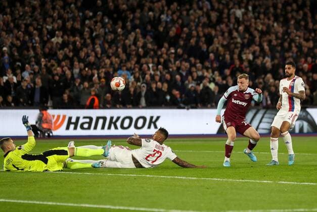 Mandatory Credit: Photo by Andrew Fosker Shutterstock (12885085bn) Jarrod Bowen of West Ham United scores 1-0 West Ham United v Olympique Lyonnais, UEFA Europa League, Quarter Final, First Leg, Football, The London Stadium, London, UK - 07 Apr 2022 EDITORIAL USE ONLY No use with unauthorised audio, video, data, fixture lists, club league logos or live services. Online in-match use limited to 120 images, no video emulation. No use in betting, games or single club league player publications. West Ham United v Olympique Lyonnais, UEFA Europa League, Quarter Final, First Leg, Football, The London Stadium, London, UK - 07 Apr 2022 EDITORIAL USE ONLY No use with unauthorised audio, video, data, fixture lists, club league logos or live services. Online in-match use limited to 120 images, no video emulation. No use in betting, games or single club league player publications. Copyright: xAndrewxFosker Shutterstockx 12885085bn