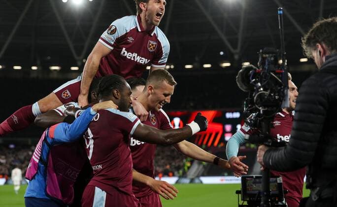 Mandatory Credit: Photo by Andrew Fosker Shutterstock (12885085cp) Tomas Soucek of West Ham United celebrates following a goal from Jarrod Bowen of West Ham United 1-0 West Ham United v Olympique Lyonnais, UEFA Europa League, Quarter Final, First Leg, Football, The London Stadium, London, UK - 07 Apr 2022 EDITORIAL USE ONLY No use with unauthorised audio, video, data, fixture lists, club league logos or live services. Online in-match use limited to 120 images, no video emulation. No use in betting, games or single club league player publications. West Ham United v Olympique Lyonnais, UEFA Europa League, Quarter Final, First Leg, Football, The London Stadium, London, UK - 07 Apr 2022 EDITORIAL USE ONLY No use with unauthorised audio, video, data, fixture lists, club league logos or live services. Online in-match use limited to 120 images, no video emulation. No use in betting, games or single club league player publications. Copyright: xAndrewxFosker Shutterstockx 12885085cp