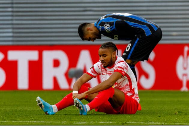 Leipzig, Germany 07 April 2022 Europa League 2021 2022 RB Leipzig vs Bergamo Christopher Nkunku RB Leipzig sits pensively on the ground Red Bull Stadion Saxony Copyright: xFotostandx xMatybax