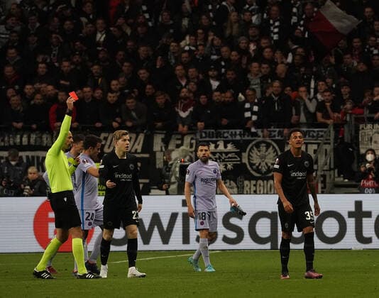 Germany, Frankfurt, 07 04 2022, Deutsche Bank Park, Eintracht Frankfurt v FC Barcelona UEFA Champions League quarterfinal, Tuta Frankfurt receives his 2 yellow card for the foul on Pedri Barcelona and has to leave the field with red Photo EU Images Frankfurt Deutsche Bank Park Hessen Germany  eu-images-506