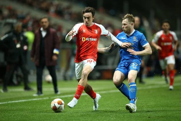 Mandatory Credit: Photo by Michael Zemanek Shutterstock (12885087as) Andre Horta of Sporting Braga competes for the ball with Scott Arfield of Rangers Braga v Rangers, UEFA Europa League, Quarter Final, First Leg, Football, Estadio Municipal de Braga, Braga, Portugal - 07 Apr 2022 EDITORIAL USE ONLY No use with unauthorised audio, video, data, fixture lists, club league logos or live services. Online in-match use limited to 120 images, no video emulation. No use in betting, games or single club league player publications. Braga v Rangers, UEFA Europa League, Quarter Final, First Leg, Football, Estadio Municipal de Braga, Braga, Portugal - 07 Apr 2022 EDITORIAL USE ONLY No use with unauthorised audio, video, data, fixture lists, club league logos or live services. Online in-match use limited to 120 images, no video emulation. No use in betting, games or single club league player publications.  Copyright: xMichaelxZemanek Shutterstockx 12885087as