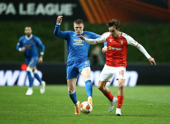 Mandatory Credit: Photo by Michael Zemanek Shutterstock (12885087bn) John Lundstram of Rangers and Andre Horta of Sporting Braga Braga v Rangers, UEFA Europa League, Quarter Final, First Leg, Football, Estadio Municipal de Braga, Braga, Portugal - 07 Apr 2022 EDITORIAL USE ONLY No use with unauthorised audio, video, data, fixture lists, club league logos or live services. Online in-match use limited to 120 images, no video emulation. No use in betting, games or single club league player publications. Braga v Rangers, UEFA Europa League, Quarter Final, First Leg, Football, Estadio Municipal de Braga, Braga, Portugal - 07 Apr 2022 EDITORIAL USE ONLY No use with unauthorised audio, video, data, fixture lists, club league logos or live services. Online in-match use limited to 120 images, no video emulation. No use in betting, games or single club league player publications.  Copyright: xMichaelxZemanek Shutterstockx 12885087bn