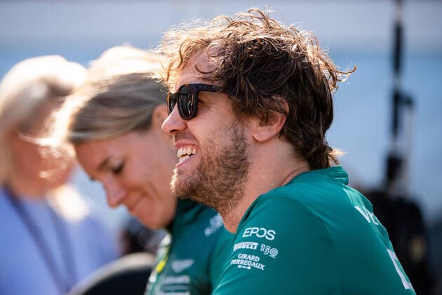 Sebastian Vettel GER, Aston Martin Aramco Cognizant F1 Team 5 laughs, behind Britta Roeske Press Officer , AUS, Formula 1 Australian Grand Prix, Albert Park Circuit Melbourne, Free Practice, 08 04 2022 AUS, Formula 1 Australian Grand Prix, Albert Park Circuit Melbourne, Free Practice, 08 04 2022 Melbourne Copyright: xEibner Memmlerx EP_MMR