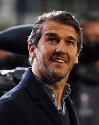RTL expert Karl Heinz Riedle takes photos on 7 4 2022 in Frankfurt at the soccer Europa League match Eintracht Frankfurt vs FC Barcelona DFL DFB REGULATIONS PROHIBIT ANY USE OF PHOTOGRAPHS as IMAGE SEQUENCES and or QUASI VIDEO