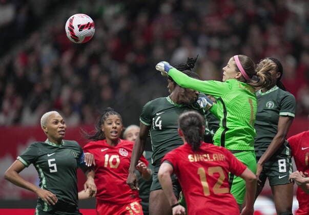 April 8, 2022, VANCOUVER, BC, CANADA: Canada goalkeeper Stephanie Labbe (1) punches the ball away from Nigeria s Christy Ucheibe (14) and Ifeoma Onumonu (8) during the first half of a women s friendly soccer match, in Vancouver, on Friday, April 8, 2022. Canada News - April 8, 2022  - ZUMAc35_ 20220408_zaf_c35_202 Copyright: xDarrylxDyckx