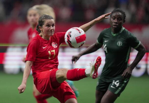 April 8, 2022, VANCOUVER, BC, CANADA: Canada s Jessie Fleming, front left, kicks the ball away from Nigeria s Christy Ucheibe during the first half of a women s friendly soccer match, in Vancouver, on Friday, April 8, 2022. Canada News - April 8, 2022 - ZUMAc35_ 20220408_zaf_c35_214 Copyright: xDarrylxDyckx