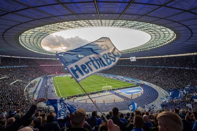 football Berlin 09 04 2022 season 2021 2022 1 Bundesliga DFL Hertha BSC Berlin 1 FC Union Berlin Berlin Olympiastadion sports facility Hertha fans in the foreground