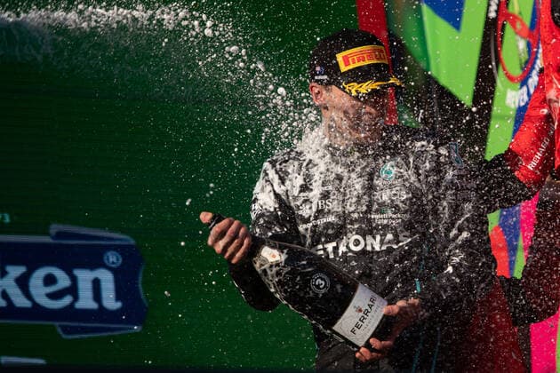 George Russell UK, Mercedes AMG Petronas F1 Team 63 celebrates his first podium with Mercedes and splashes champagne, AUS, Formula 1 Australian Grand Prix, Albert Park Circuit Melbourne, Race Day, 10 04 2022 AUS, Formula 1 Australian Grand Prix, Albert Park Circuit Melbourne, Race Day, 10 04 2022 Copyright: xEibner Memmlerx EP_MMR