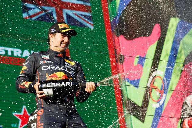 10th April 2022, Albert Park, Melbourne, Australia; FIA Formula 1 Australian Grand Prix, Race Day: Red Bull driver Sergio Perez is second on the podium at the Australian Formula 1 Grandprix  ActionPlus12378087 StephenxBlackberry