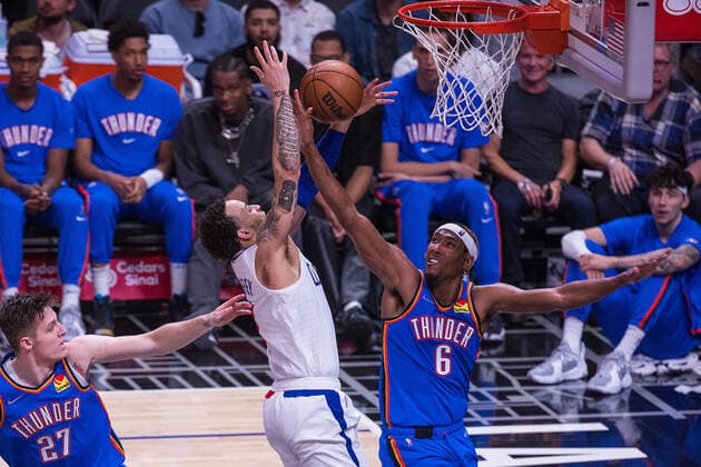 April 10, 2022, Los Angeles, California, USA: Melvin Frazier Jr. 6 of the Oklahoma Thunder blocks a shot from Amir Coffey 7 of the Los Angeles Clippers during their NBA, Basketball Herren, USA game against on Sunday April 10, 2022 at Crypto.com Arena in Los Angeles, California. Clippers defeat Thunder, 138-88. ARIANA RUIZ PI Los Angeles USA - ZUMAp124 20220410_zaa_p124_036 Copyright: xArianaxRuizx