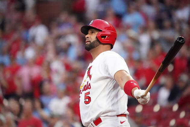 St. Louis Cardinals designated hitter Albert Pujols watches his 680 career home run leave Busch Stadium in the first inning against the Kansas City Royals in St. Louis on Tuesday, April 12, 2022.  SLP2022041210 BILLxGREENBLATT
