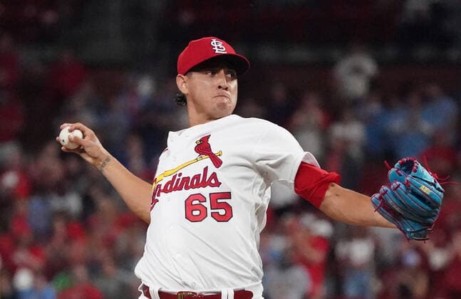St. Louis Cardinals pitcher Giovanny Gallegos delivers a pitch to the Kansas City Royals in the ninth inning at Busch Stadium in St. Louis on Tuesday, April 12, 2022.  SLP2022041220 BILLxGREENBLATT