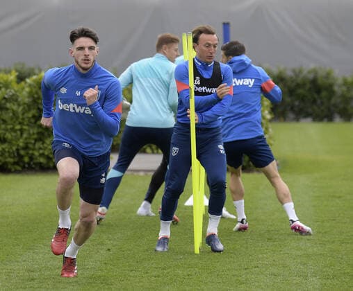 Mandatory Credit: Photo by Avril Husband West Ham United Shutterstock (12892856y) Declan Rice and Mark Noble of West Ham United go through some drills West Ham United First Team Training, Rush Green Training Ground, London, UK - 13 Apr 2022 EDITORIAL USE ONLY No use with unauthorised audio, video, data, fixture lists, club league logos or live services. Online in-match use limited to 120 images, no video emulation. No use in betting, games or single club league player publications. West Ham United First Team Training, Rush Green Training Ground, London, UK - 13 Apr 2022 EDITORIAL USE ONLY No use with unauthorised audio, video, data, fixture lists, club league logos or live services. Online in-match use limited to 120 images, no video emulation. No use in betting, games or single club league player publications.  Copyright: xAvrilxHusband WestxHamxUnited Shutterstockx 12892856y
