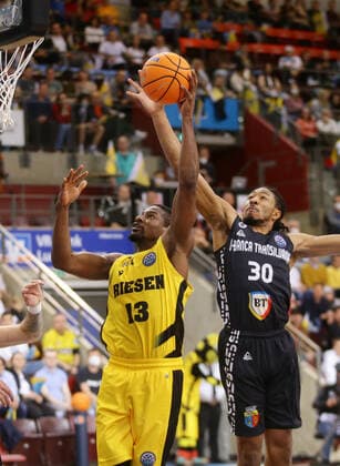 Ludwigsburg , Basketball Champions League quarterfinal game 2 , MHP Riesen Ludwigsburg vs U BT Cluj Napoca , from left Yorman Polas bartolo Riesen Elijah Stewart Cluj
