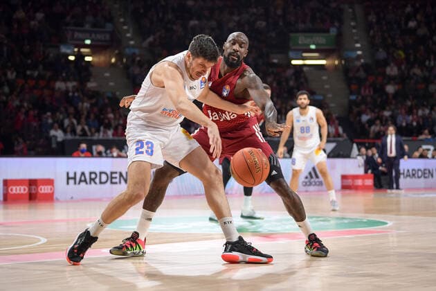Basketball, BBL, 20220413, FC Bayern Munich Mitteldeutscher Basketball Club In the picture Goran HUSKIC Mitteldeutscher Basketball Club, 23 and Othello HUNTER FC Bayern Munich, 8 duel ball Munich Audi Dome Bavaria Germany Copyright: Passion2Press MarkusxFischerx