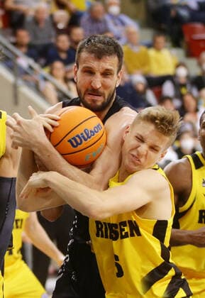 Ludwigsburg , Basketball Champions League quarterfinal game 2 , MHP Riesen Ludwigsburg vs U BT Cluj Napoca , from left Stefan Bircevic Cluj Jacob patrick Riesen