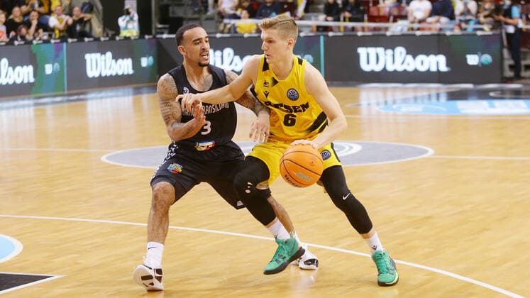 Ludwigsburg , Basketball Champions League Quarterfinal Game 2 , MHP Riesen Ludwigsburg vs U BT Cluj Napoca , from left Brandon Brown Cluj Johannes Patrick Riesen