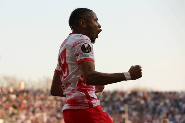 Fußball, EL, Atalanta Bergamo - RB Leipzig Bergamo, Italy, 14th April 2022. Christopher Nkunku of RB Leipzig celebrates after scoring to give the side a 1-0 lead during the UEFA Europa League match at Gewiss Stadium, Bergamo. Picture credit should read: Jonathan Moscrop Sportimage EDITORIAL USE ONLY. No use with unauthorised audio, video, data, fixture lists, club league logos or live services. Online in-match use limited to 120 images, no video emulation. No use in betting, games or single club league player publications. SPI-1637-0003