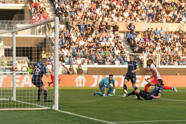 Bergamo, Italy, 14th April 2022. Christopher Nkunku of RB Leipzig scores to give the side a 1-0 lead during the UEFA Europa League match at Gewiss Stadium, Bergamo. Picture credit should read: Jonathan Moscrop Sportimage EDITORIAL USE ONLY. No use with unauthorised audio, video, data, fixture lists, club league logos or live services. Online in-match use limited to 120 images, no video emulation. No use in betting, games or single club league player publications. SPI-1637-0006