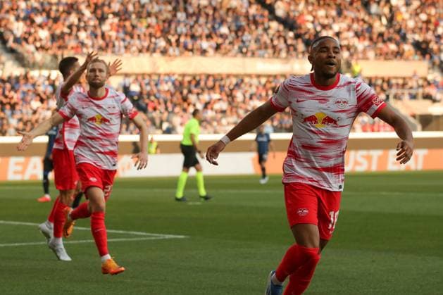 Bergamo, Italy, 14th April 2022. Christopher Nkunku of RB Leipzig celebrates with team mates after scoring to give the side a 1-0 lead during the UEFA Europa League match at Gewiss Stadium, Bergamo. Picture credit should read: Jonathan Moscrop Sportimage EDITORIAL USE ONLY. No use with unauthorised audio, video, data, fixture lists, club league logos or live services. Online in-match use limited to 120 images, no video emulation. No use in betting, games or single club league player publications. SPI-1637-0012