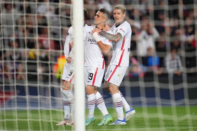 ESP: FC Barcelona, Barca v Eintracht Frankfurt. UEFA Europa League Rafael Borre of Eintracht Frankfurt celebrates with his teammates Kristijan Jakic and Sam Lammers of Eintracht Frankfurt after scoring the 0-2 during the UEFA Europa League match, Quarter Final, Second Leg, between FC Barcelona and Eintracht Frankfurt played at Camp Nou Stadium on April 14, 2022 in Barcelona, Spain. kpng Copyright: xColasxBuerax xPRESSINPHOTOx PS_220414_591