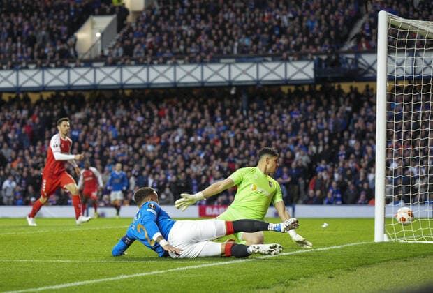 Mandatory Credit: Photo by Stuart Wallace Shutterstock (12893325r) Rangers Captain James Tavernier shoots past SC Braga goalkeeper Matheus to score and give Rangers a 1-0 lead (agg. 1-1). Rangers v Braga, UEFA Europa League, Quarter Final, Second Leg, Football, Ibrox Stadium, Glasgow, UK - 14 Apr 2022 EDITORIAL USE ONLY No use with unauthorised audio, video, data, fixture lists, club league logos or live services. Online in-match use limited to 120 images, no video emulation. No use in betting, games or single club league player publications. Rangers v Braga, UEFA Europa League, Quarter Final, Second Leg, Football, Ibrox Stadium, Glasgow, UK - 14 Apr 2022 EDITORIAL USE ONLY No use with unauthorised audio, video, data, fixture lists, club league logos or live services. Online in-match use limited to 120 images, no video emulation. No use in betting, games or single club league player publications.  Copyright: xStuartxWallace Shutterstockx 12893325r