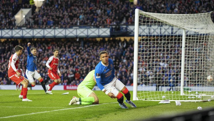 Mandatory Credit: Photo by Stuart Wallace Shutterstock (12893325y) Rangers Captain James Tavernier shoots past SC Braga goalkeeper Matheus to score and give Rangers a 1-0 lead (agg. 1-1). Rangers v Braga, UEFA Europa League, Quarter Final, Second Leg, Football, Ibrox Stadium, Glasgow, UK - 14 Apr 2022 EDITORIAL USE ONLY No use with unauthorised audio, video, data, fixture lists, club league logos or live services. Online in-match use limited to 120 images, no video emulation. No use in betting, games or single club league player publications. Rangers v Braga, UEFA Europa League, Quarter Final, Second Leg, Football, Ibrox Stadium, Glasgow, UK - 14 Apr 2022 EDITORIAL USE ONLY No use with unauthorised audio, video, data, fixture lists, club league logos or live services. Online in-match use limited to 120 images, no video emulation. No use in betting, games or single club league player publications.  Copyright: xStuartxWallace Shutterstockx 12893325y