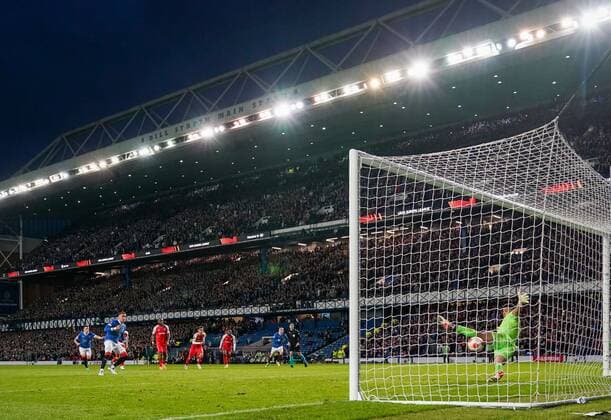 Mandatory Credit: Photo by Stuart Wallace Shutterstock (12893325ce) Rangers Captain James Tavernier beats SC Braga goalkeeper Matheus from the penalty spot to give Rangers a 2-0 lead (agg. 2-1). Rangers v Braga, UEFA Europa League, Quarter Final, Second Leg, Football, Ibrox Stadium, Glasgow, UK - 14 Apr 2022 EDITORIAL USE ONLY No use with unauthorised audio, video, data, fixture lists, club league logos or live services. Online in-match use limited to 120 images, no video emulation. No use in betting, games or single club league player publications. Rangers v Braga, UEFA Europa League, Quarter Final, Second Leg, Football, Ibrox Stadium, Glasgow, UK - 14 Apr 2022 EDITORIAL USE ONLY No use with unauthorised audio, video, data, fixture lists, club league logos or live services. Online in-match use limited to 120 images, no video emulation. No use in betting, games or single club league player publications.  Copyright: xStuartxWallace Shutterstockx 12893325ce
